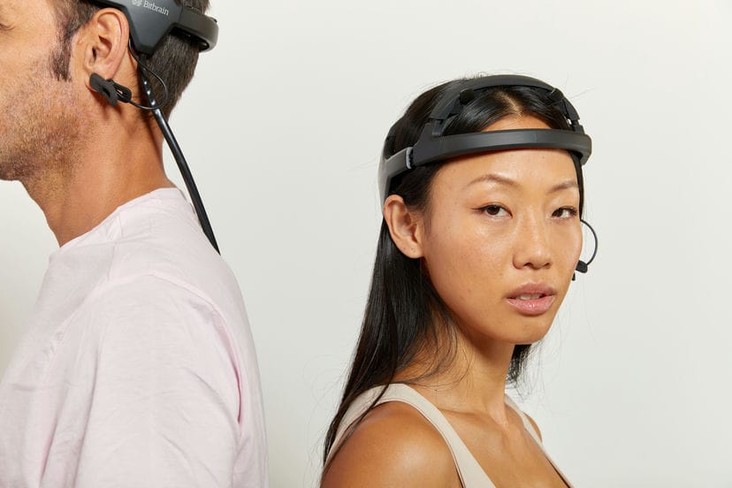 Man and woman wearing Bitbrain's Diadem device